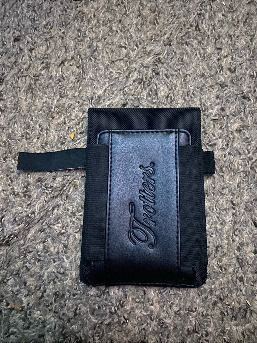 Black minimalist elastic and faux leather card holder